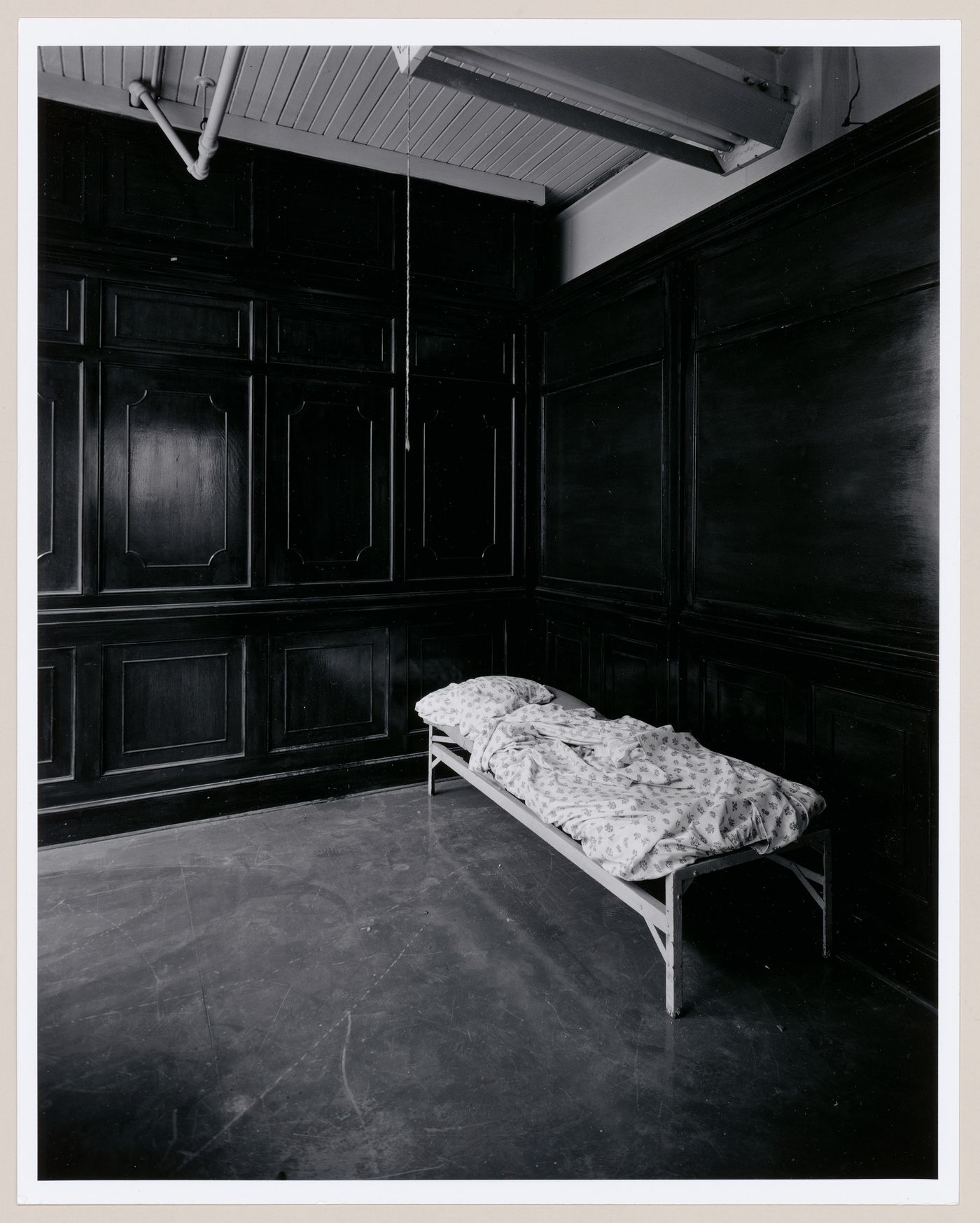 Interior view of the main office area second floor of the administration building of the Belding Corticelli Spinning Mill showing a bed, Montréal, Québec