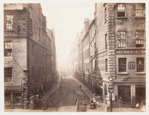 View of Bell Street from High Street showing commercial buildings, Glasgow, Scotland
