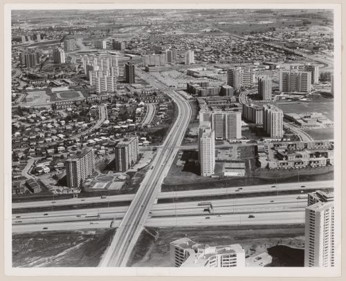 Don Mills MacDonald-Carter freeway (i.e. Hwy. 401) crosses foreground. Don Mills Road proceeds northward, Toronto, Ontario