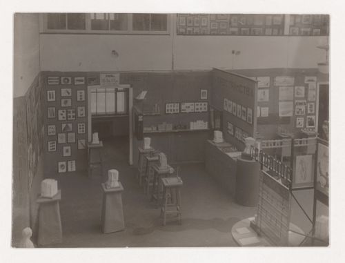 View of the Basic Course Report exhibition of student projects showing models, drawings and a sculpture at the Vkhutemas (Higher State Artistic Technical Studios), Moscow
