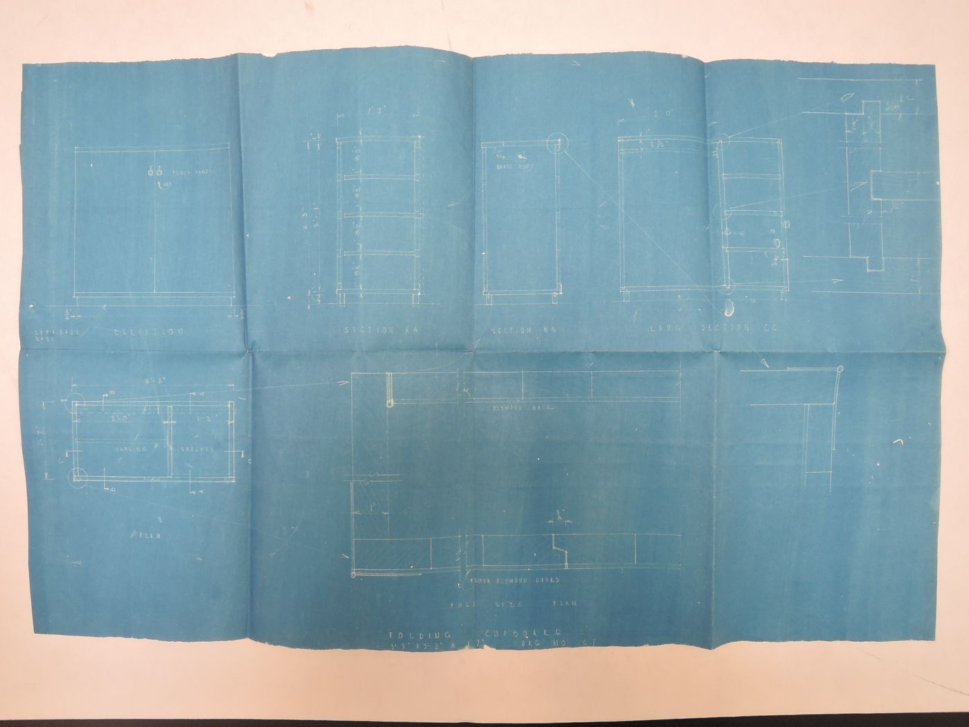 Plans and sections for a folding cupboard