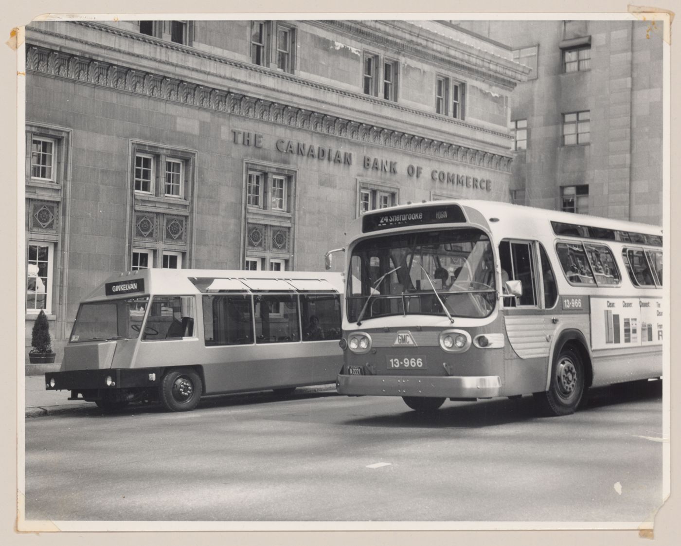 View of the Ginkelvan prototype and a Montreal city bus