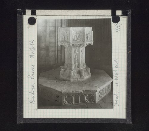 View of baptismal font at the west end of Binham Priory, Norfolk, England