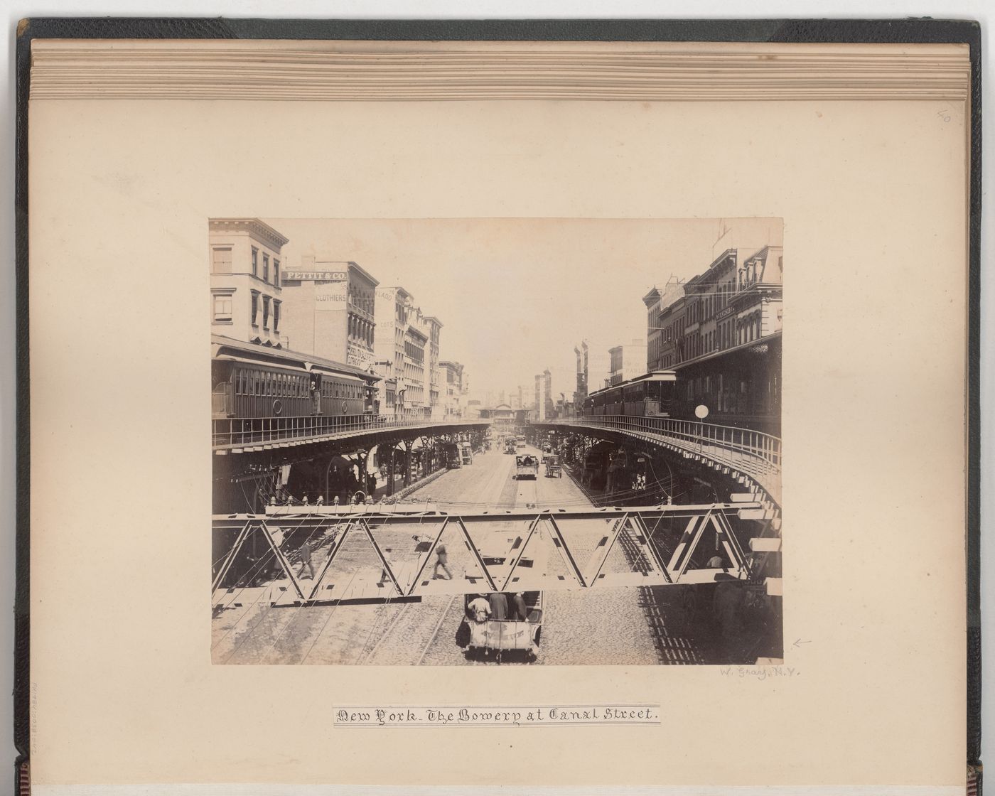 View of elevated trains at The Bowery [street] from Canal Street, New York City, New York