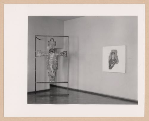 Interior view of the Sala della croce giunteesca showing a painted crucifix mounted on a metal easel and a painting, Palazzo Abatellis, Galleria regionale della Sicilia, Palermo, Italy