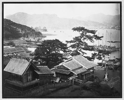View of the Ebisu Shrine complex and the town of Akunoura, with the harbour and city of Nagasaki in the background, Japan