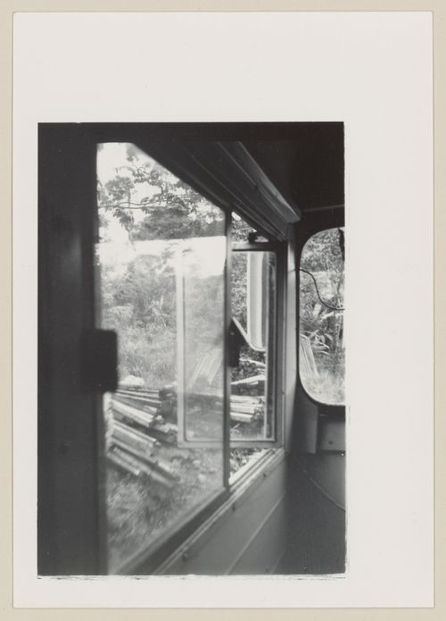 Bus window frame and landscape, South America