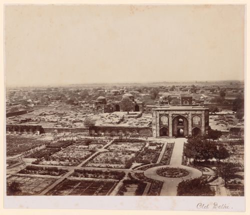 View showing a gateway, the remains of fortifications, and formal gardens in the foreground, Delhi, India