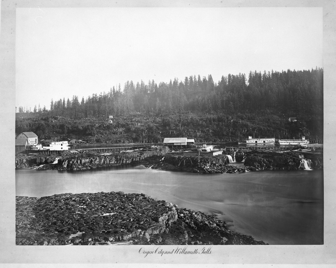 View of Imperial Mills across river, Oregon City, Oregon