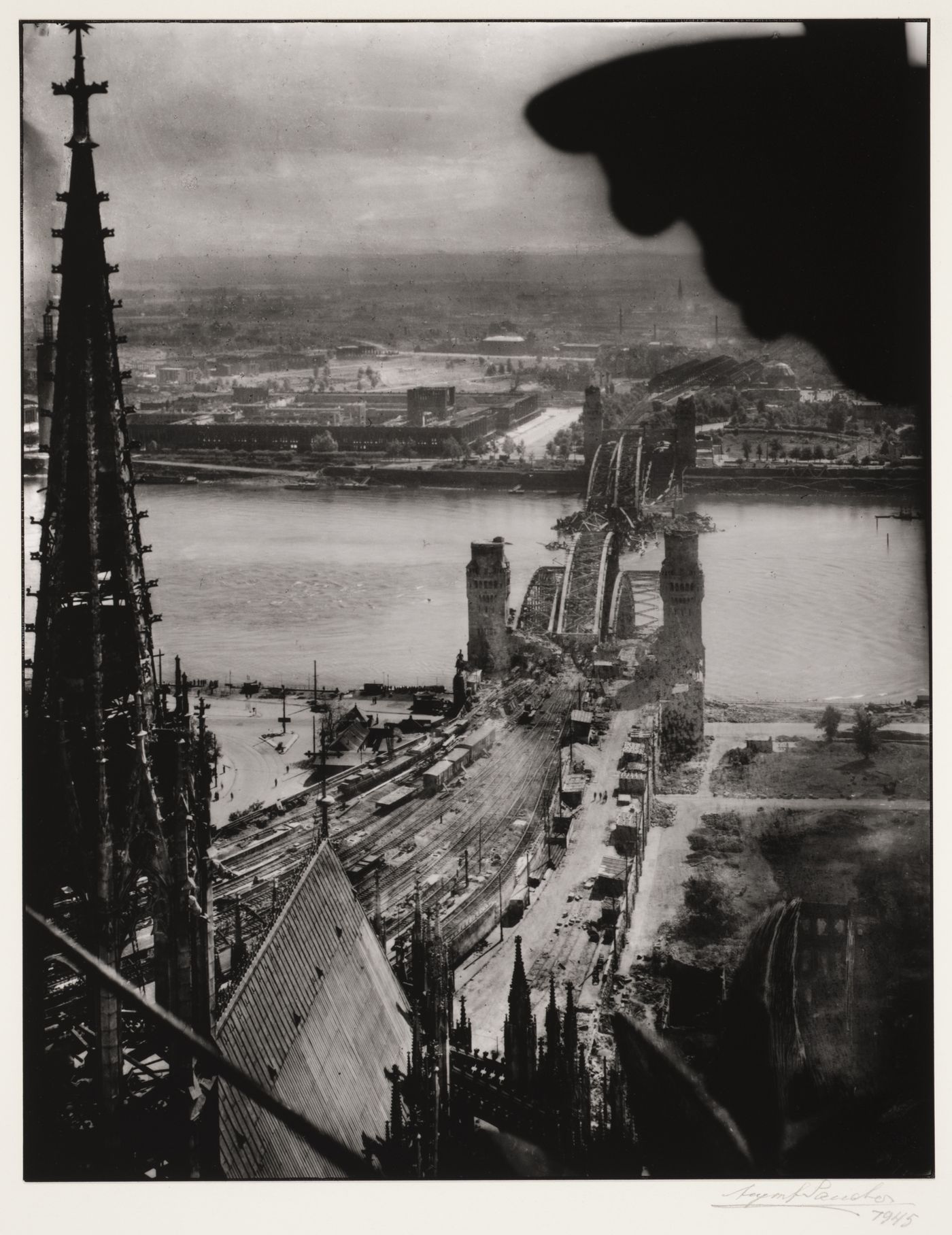 View from the cathedral to Hohenzollern Bridge and exhibition center, Cologne, Germany