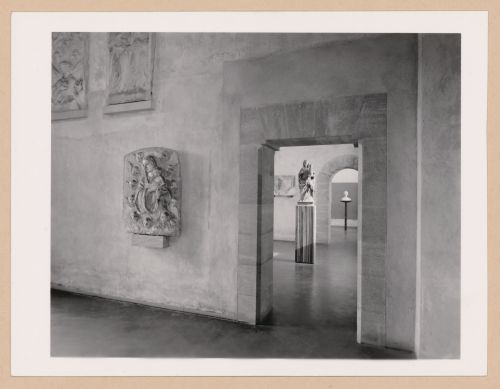 Interior view of the Sala della scultura showing reliefs and a doorway and the Sala dei Gagini, Palazzo Abatellis, Galleria regionale della Sicilia, Palermo, Italy