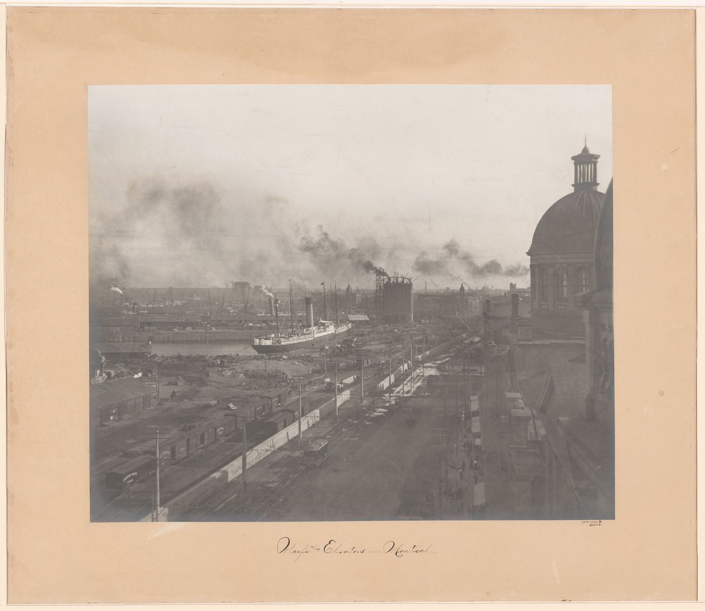 View looking south west from the tower of Notre-Dame-de-Bonsecours at various activities happening on the wharves of the port of Montréal, Québec