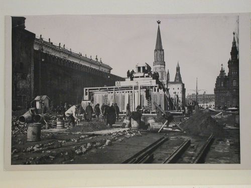 View of the lateral façade of the second wooden Lenin Mausoleum with the Nikol'skaia Tower (Nicholas Tower) and the Historical Museum in the background, Red Square, Moscow
