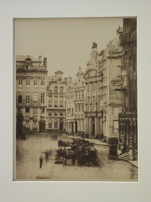 View of unidentified square, with several buildings and many carriages, Paris [?], France