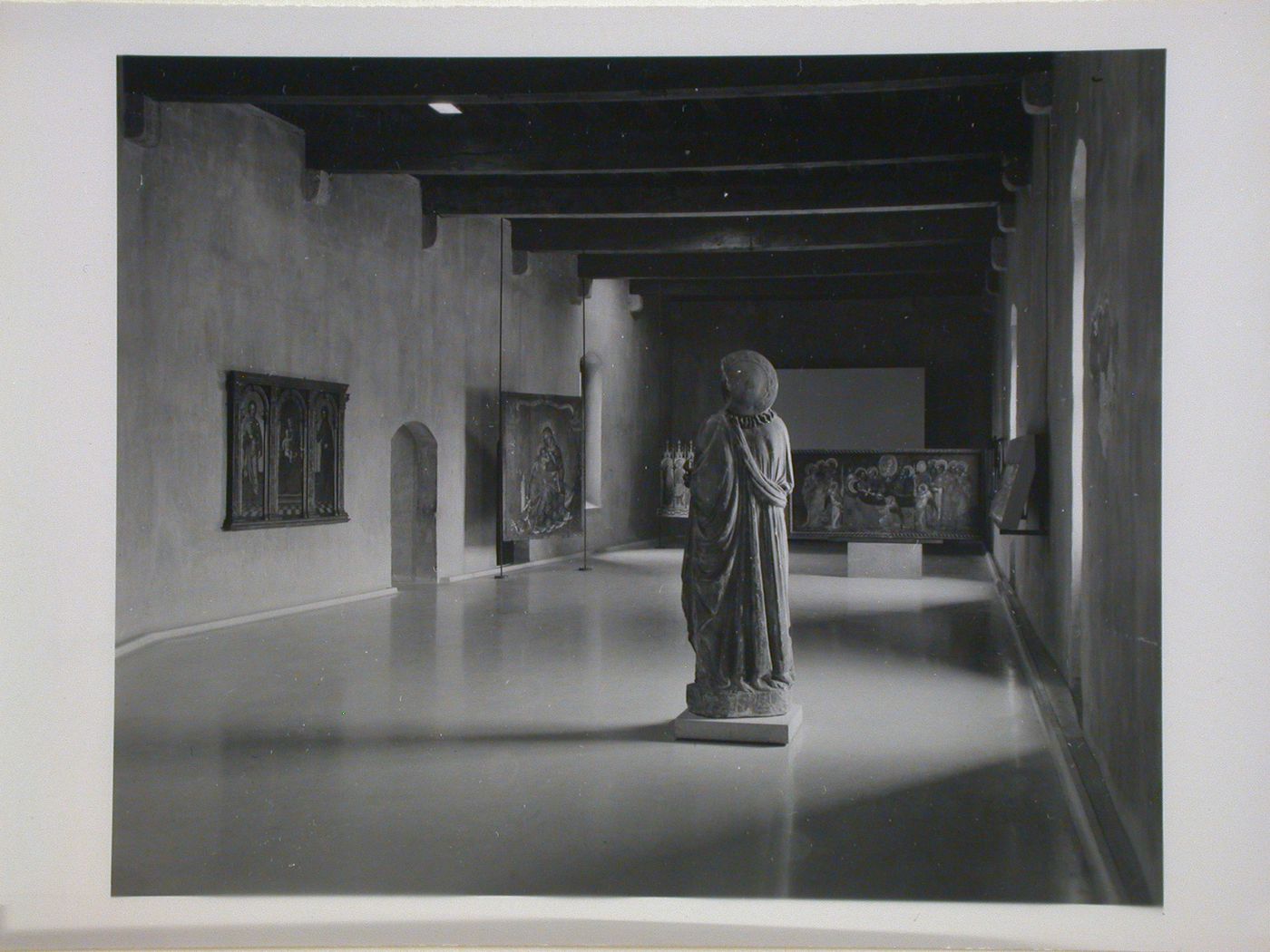 Interior view of a gallery showing a statue and paintings, Museo di Castelvecchio, Verona, Italy