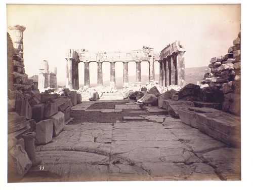 XI. Interior of the Parthenon, looking East. The grooves in the foreground are those in which the bronze gates of the treasury swing.
