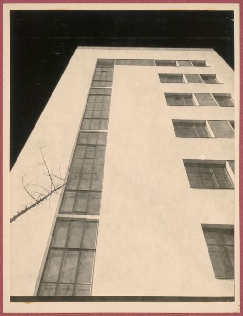 Partial exterior view of the Dukstroi Apartment Building showing windows from below, 34 Leningradskoe Shosse, Moscow