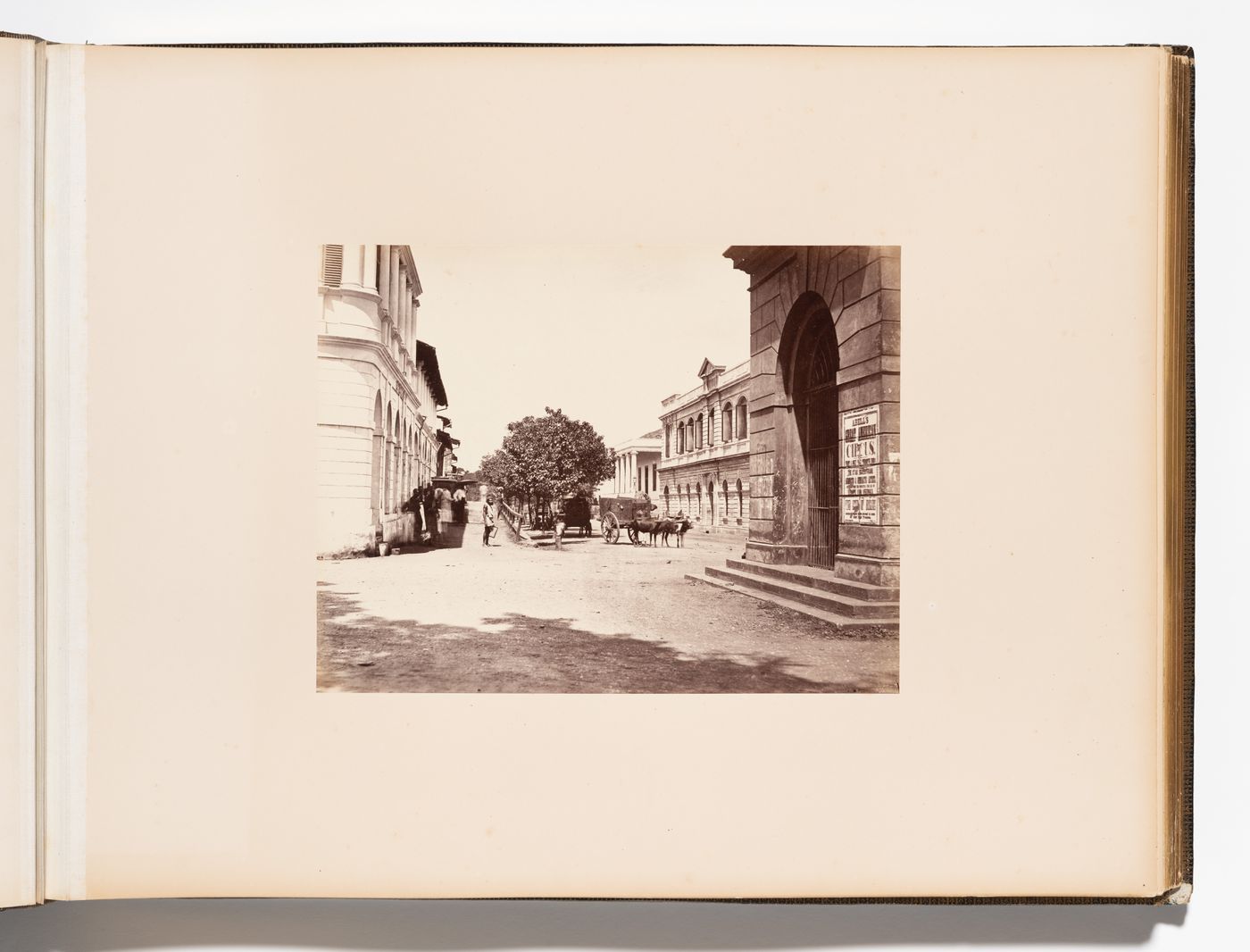 View of Thotten Street [?] showing unidentified buildings and a bullock cart, Colombo, Ceylon (now Sri Lanka)