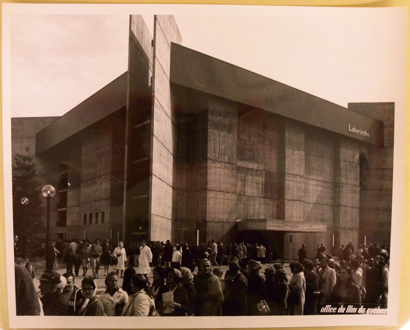 View of visitors standing in line at the Labyrinth Pavilion, Expo 67, Montréal, Québec