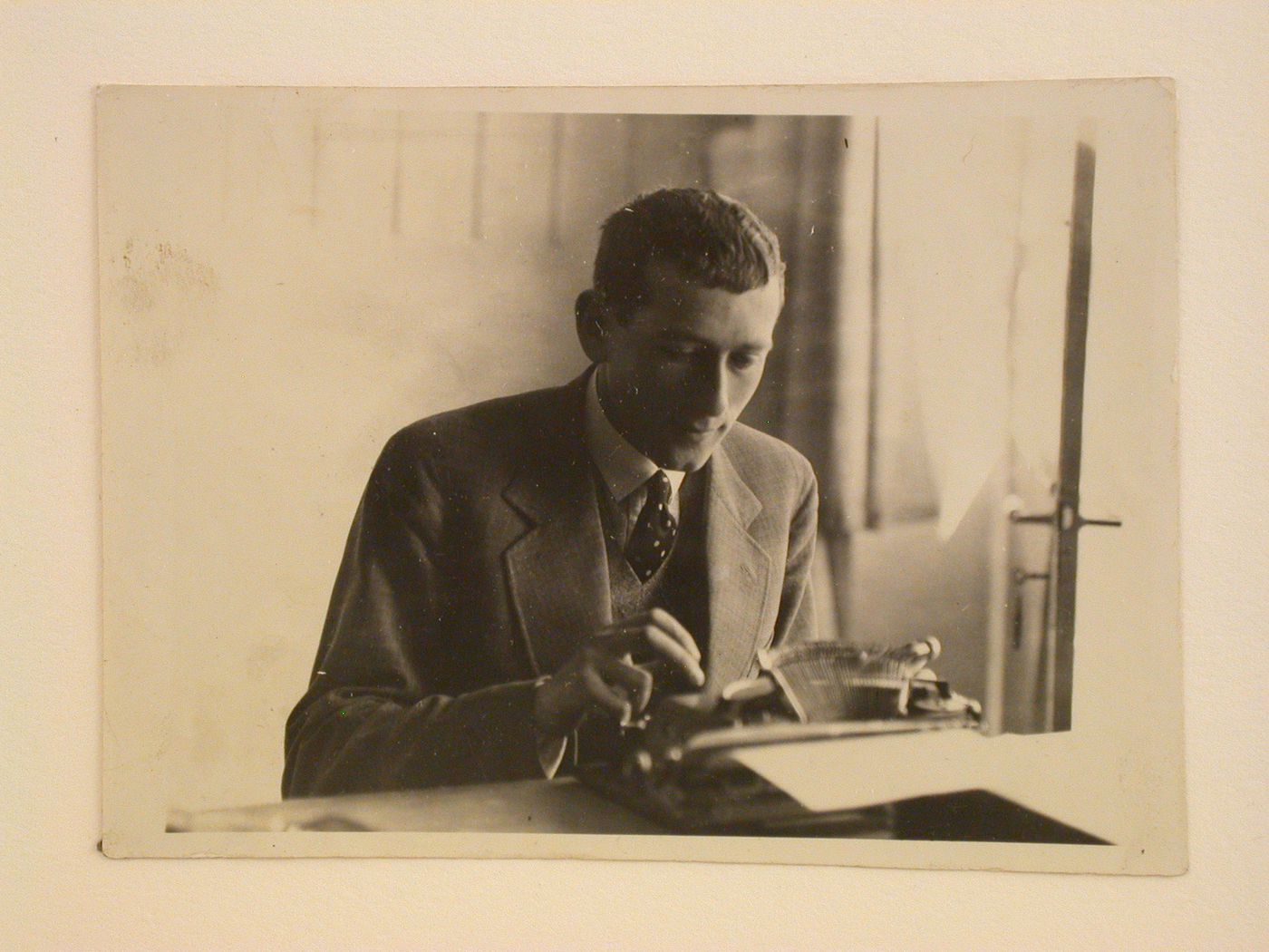 Portrait of Marcel Breuer at typewriter
