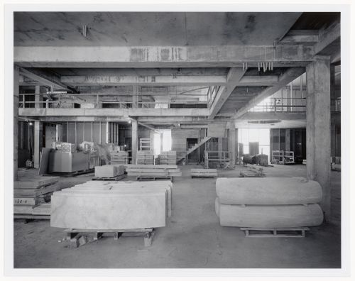 Interior view of the Alcan Wing showing stone slabs stacked on the floor, Canadian Centre for Architecture under construction, Montréal, Québec