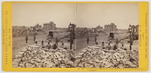 Looking down Middle Street from Free Street with U.S. Custom House in distance after the Great Fire in Portland, Maine on July 4, 1866