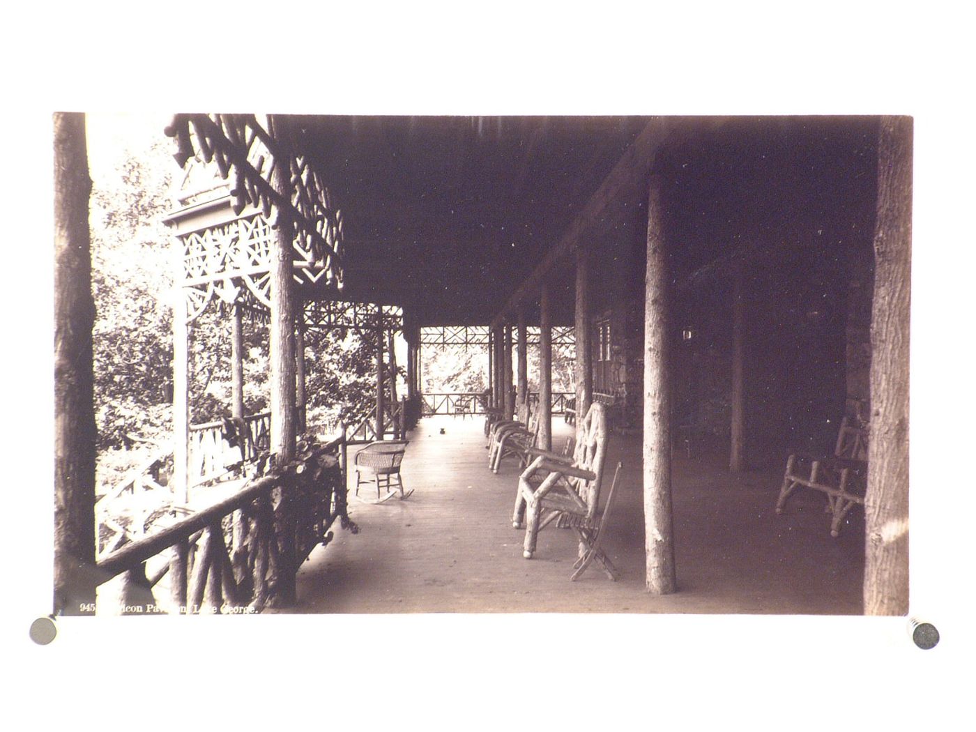 View of large rough-hewn wooden porch, Lake George, New York