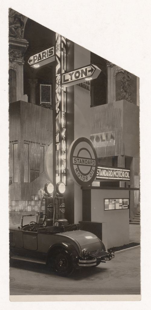 View of a car at a gas station, with signs pointing to Paris and Lyon, Salon d'automne, Paris, France