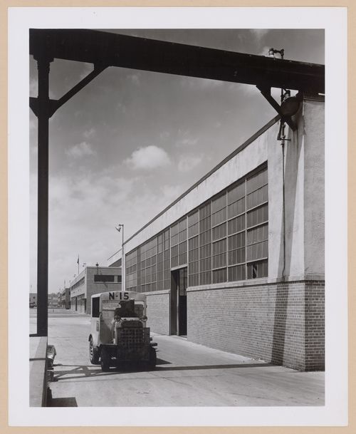 View of the principal façade of the Assembly Building (also known as Building No. 5) and the Machine Shops (also known as Building Nos. 2 and 3), United States Naval Ordnance Assembly Plant, Center Line, Michigan