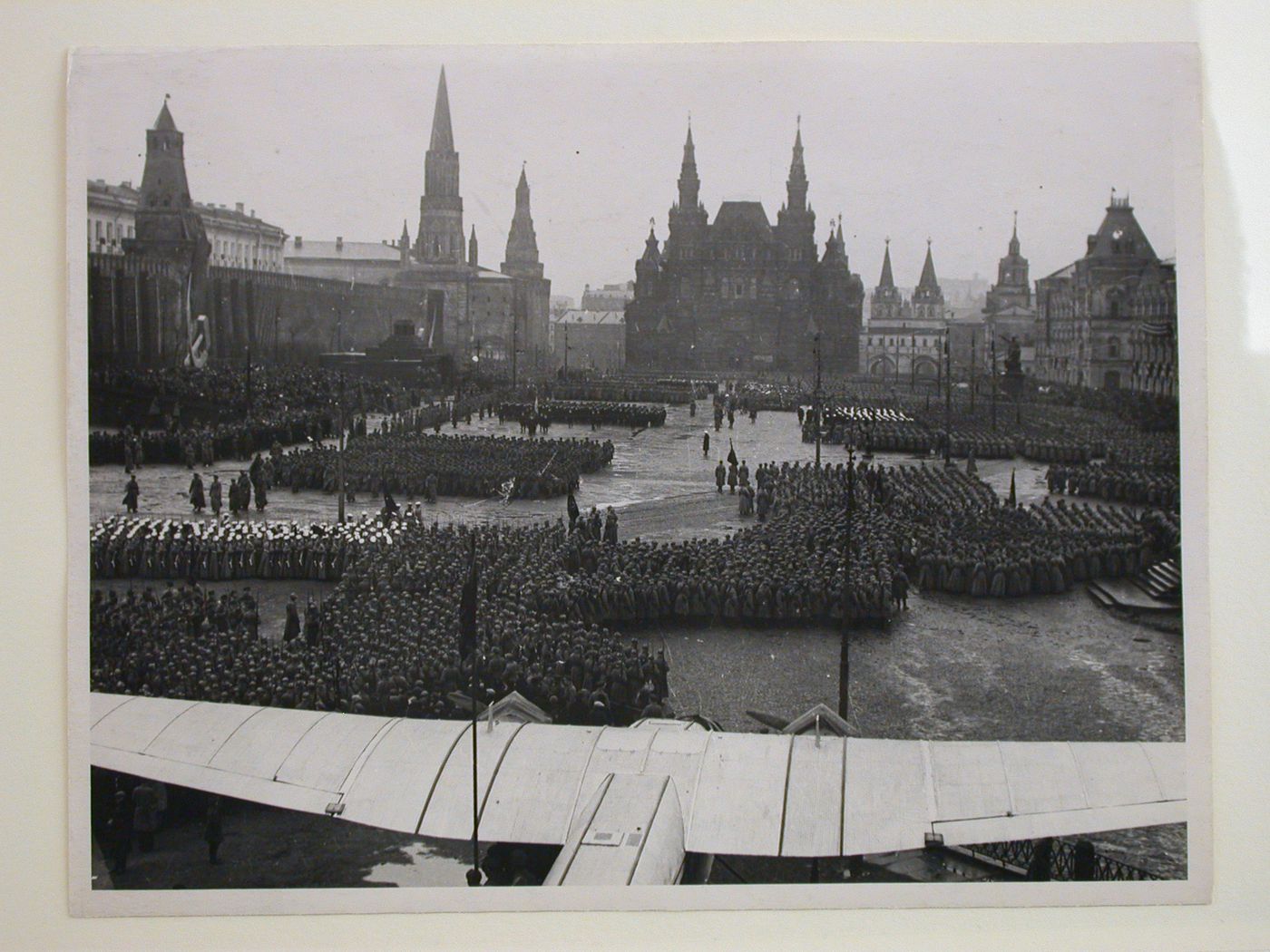 View of Red Square during a May Day parade with the Lenin Mausoleum, Senate, Nikol'skaya and Corner Arsenal Towers, Historical Museum, Voskresenskie Iverskie Gates, monument to Minin and Pozharsky, and Upper Shopping Arcades in the background, Moscow