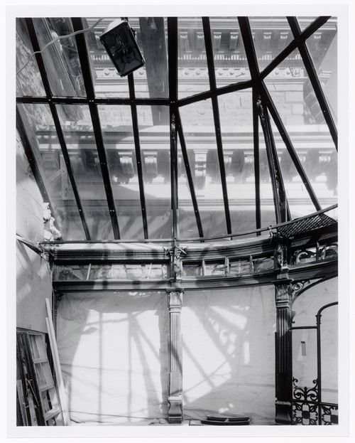 Interior view of the conservatory showing the glazed and ironwork ceiling, Shaughnessy House under renovation, Montréal, Québec