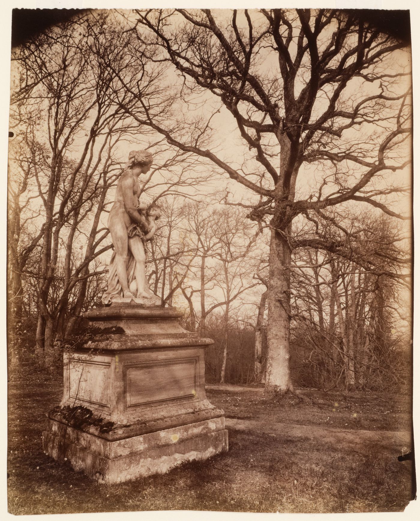 Statue of a nymph [?] on a pedestal, in the Parcde Mr. Sardou, Marly-le-Roi, France