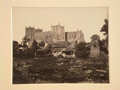 Distant exterior view of Ripon Minster from river, Ripon, North Yorkshire, England