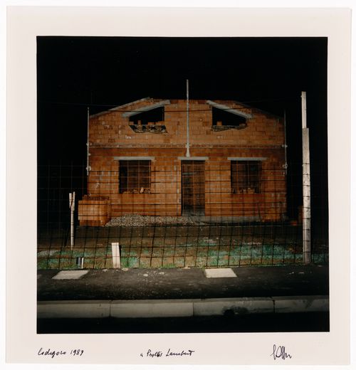 Night view of a small building made of bricks, Codigoro, Italy