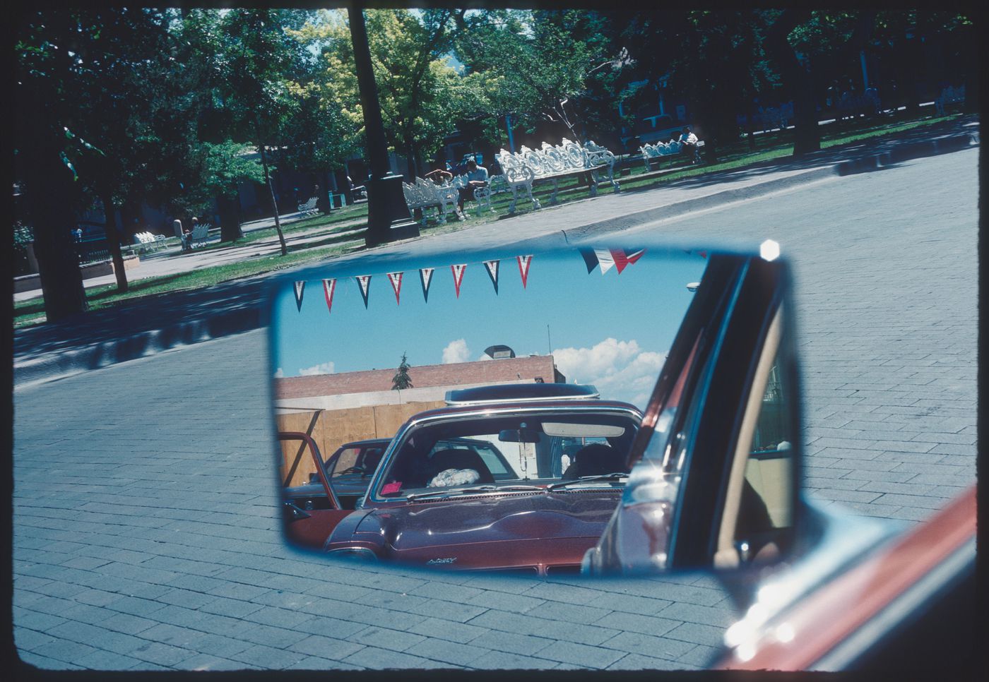 Cars seen in rear-view mirror, trip to Canyon de Chelly National Monument, Arizona