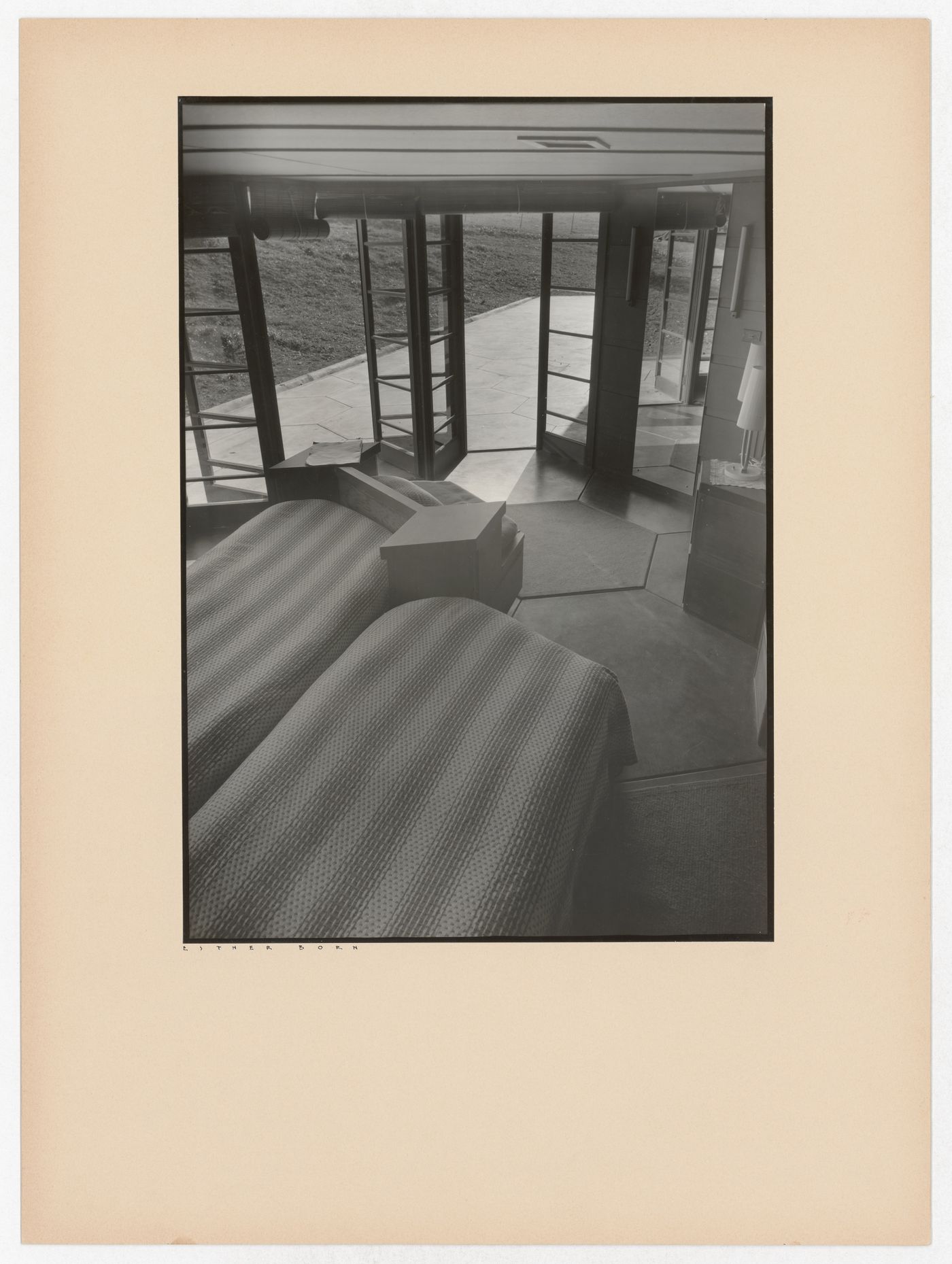 Interior view of the Hanna House showing an entrance, windows, and seating furniture, Palo Alto, California, United States