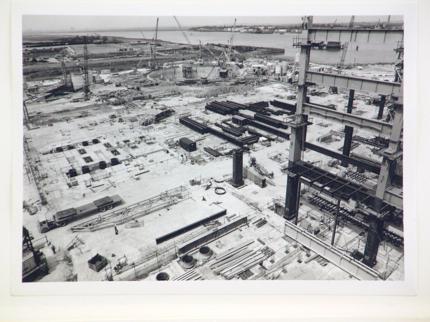 View of river and construction of power station, from above, United Kingdom