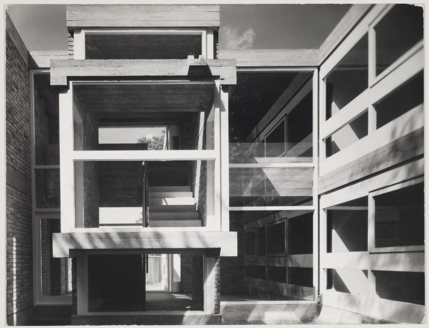 View of the entrance court of a two-storey garden pavilion, Flats at Ham Common (1955-1958), London, England