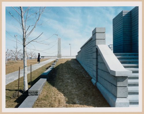 CCA Garden: Partial view of the Orchard and cadastral walls which represent rural "rangs" or property lines with the Arcade and the Obelisk-Chimney Allegorical Column in the background, Montréal, Québec, Canada