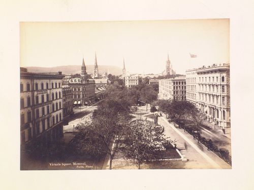 Aerial view of Victoria Square showing the monument to Queen Victoria with the Montréal Herald Printing and Publishing Co. Building and the old YMCA Headquarters on the left, Montréal, Québec