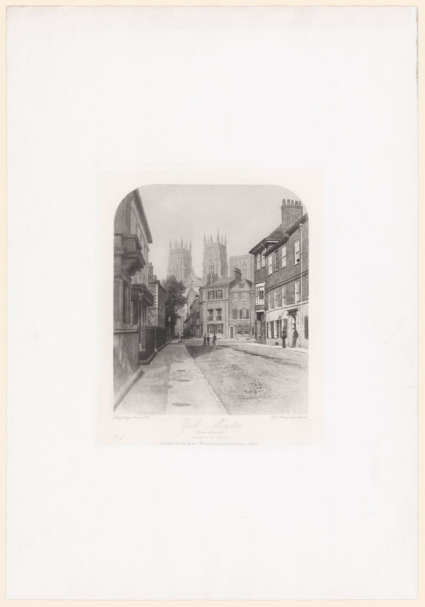General view of street and houses, towers of York Minster visible in distance, York, England