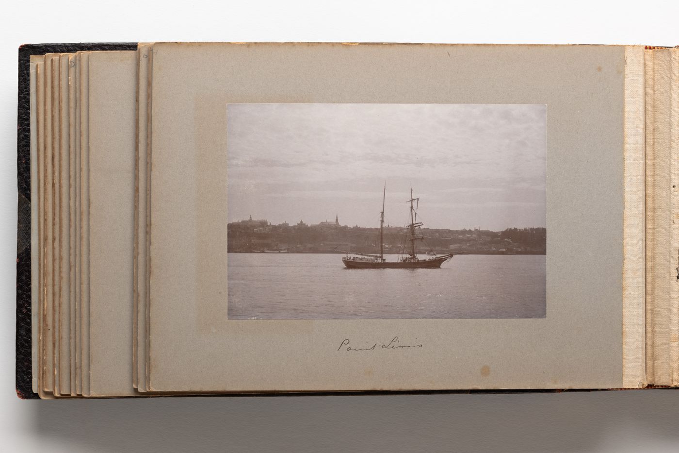 View of a sailboat on the St. Lawrence River with Levis visible in the background, Quebec, Canada