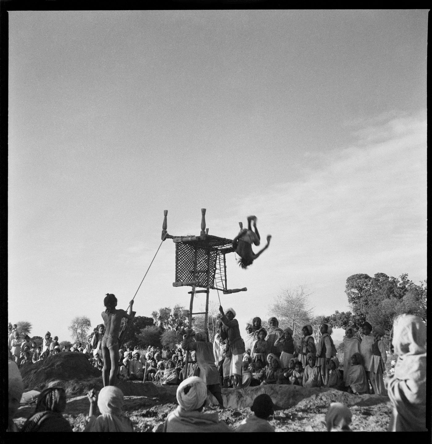 Crowd watching a diving competition in Chandigarh's area before the construction, India