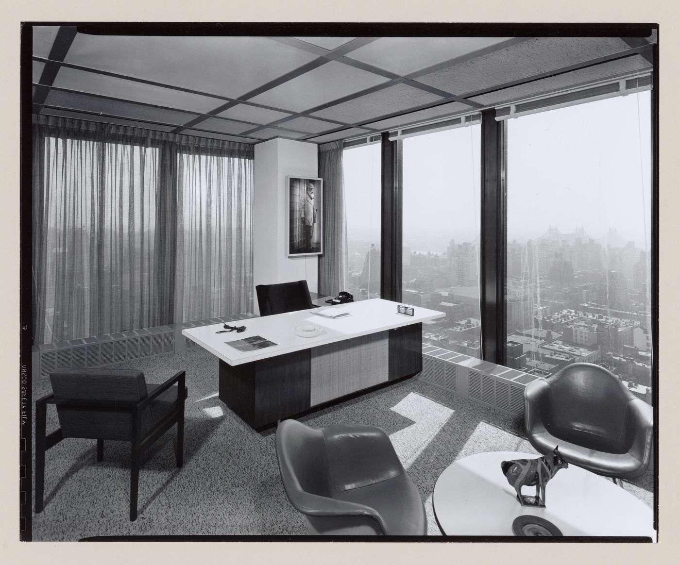 Interior view of a furnished office in the Seagram Building showing the recessed light fixtures designed by Richard Kelly, New York City