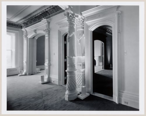 Interior view of the reception rooms showing doorways and a column, Shaughnessy House under renovation, Montréal, Québec