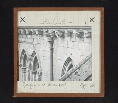 View of sculptures of grotesque heads on choir roof of Southwell Minster, Southwell, Nottinghamshire, England
