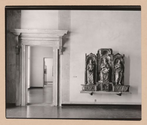 Interior view of a gallery showing a sculpture with doorways and galleries on the left, Museo Correr, Venice, Italy