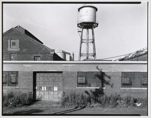 View of the east façade and water tower of the Canadian Switch & Spring Company Building, Montréal, Québec