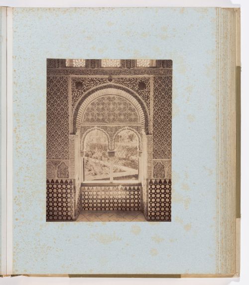 View of Moorish mullioned window overlooking the Partal Palace courtyard, from the Oratory facing south, Alhambra, Granada, Spain

