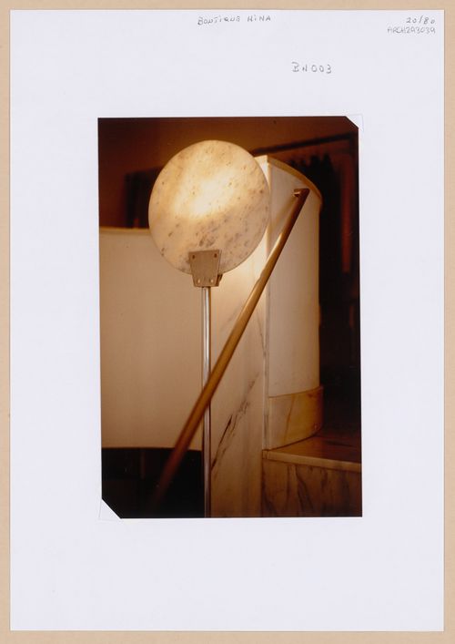 Detail view of interior light fixture and staircase of Boutique Nina, Porto, Portugal